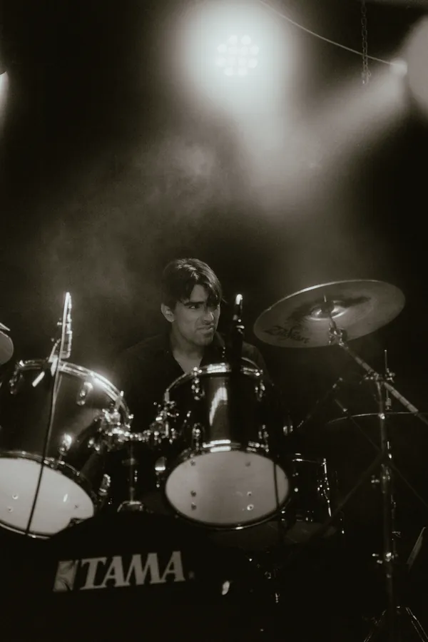 Mateo on drums at The Sound Bar, black and white